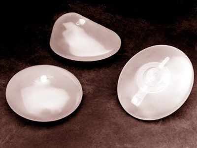 Roughness of the Surface of Silicone Breast Implants Triggers Immune Response